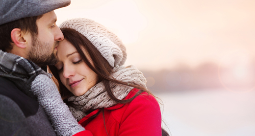 couple hugging in winter