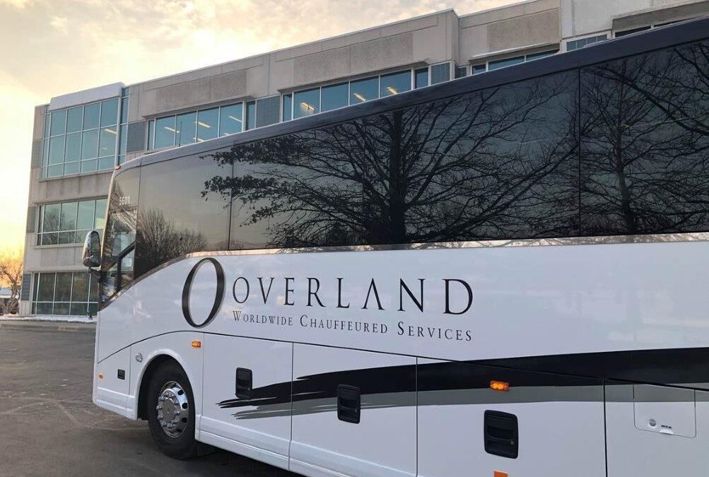 motorcoach in front of building