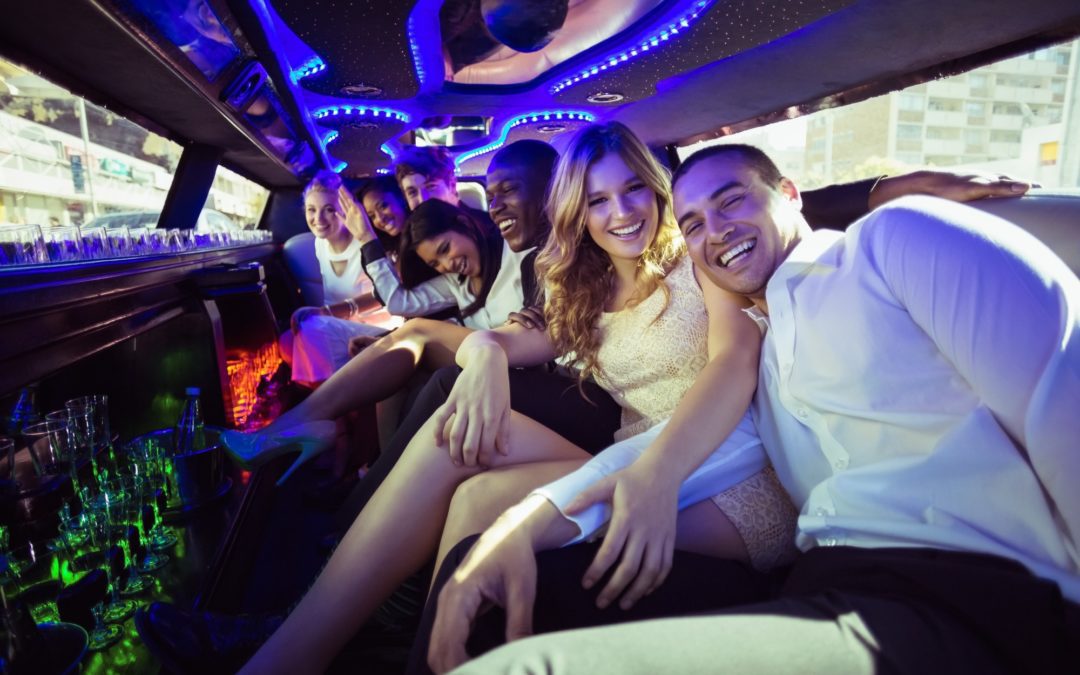 happy friends in limo